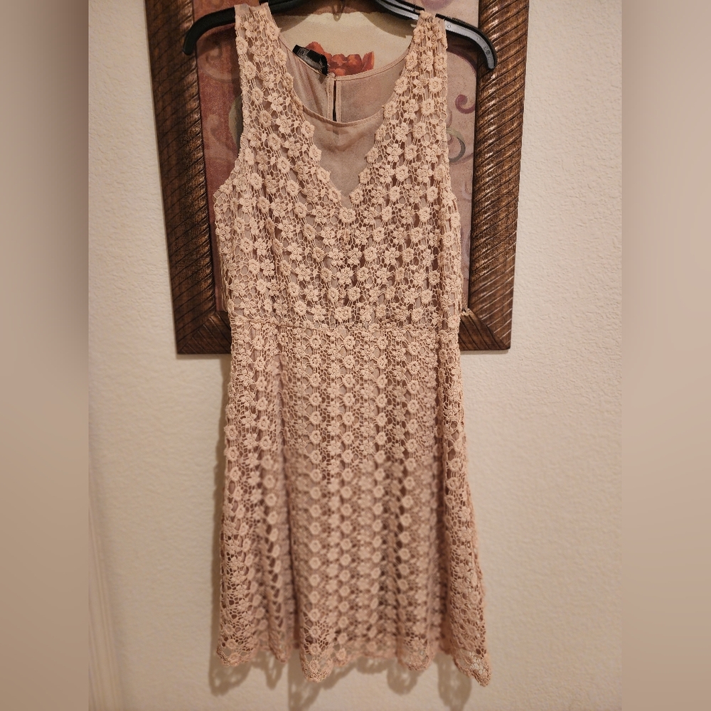 Textured dress above the knee.